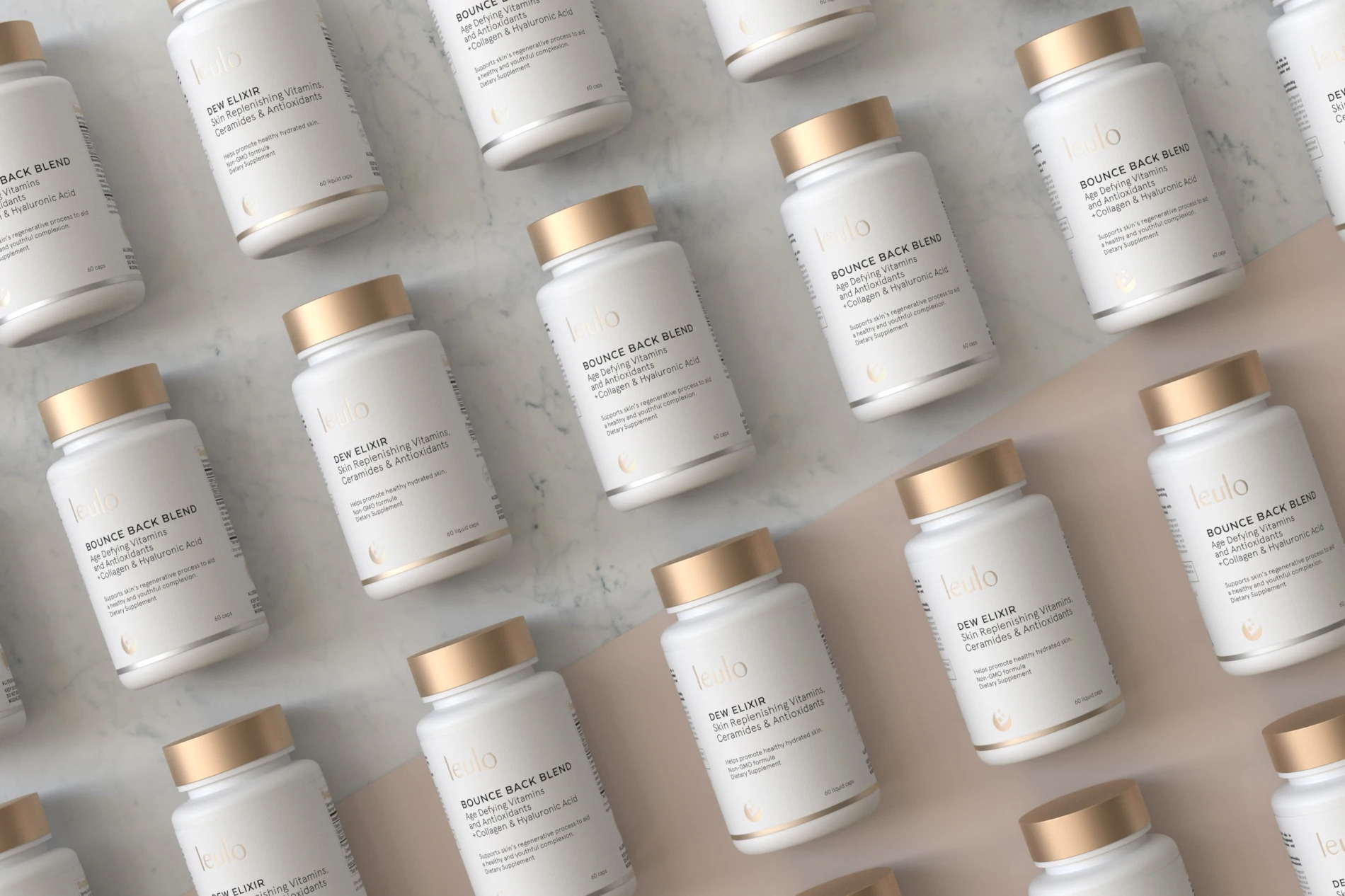 Rows of white Leulo supplement bottles on blush pink