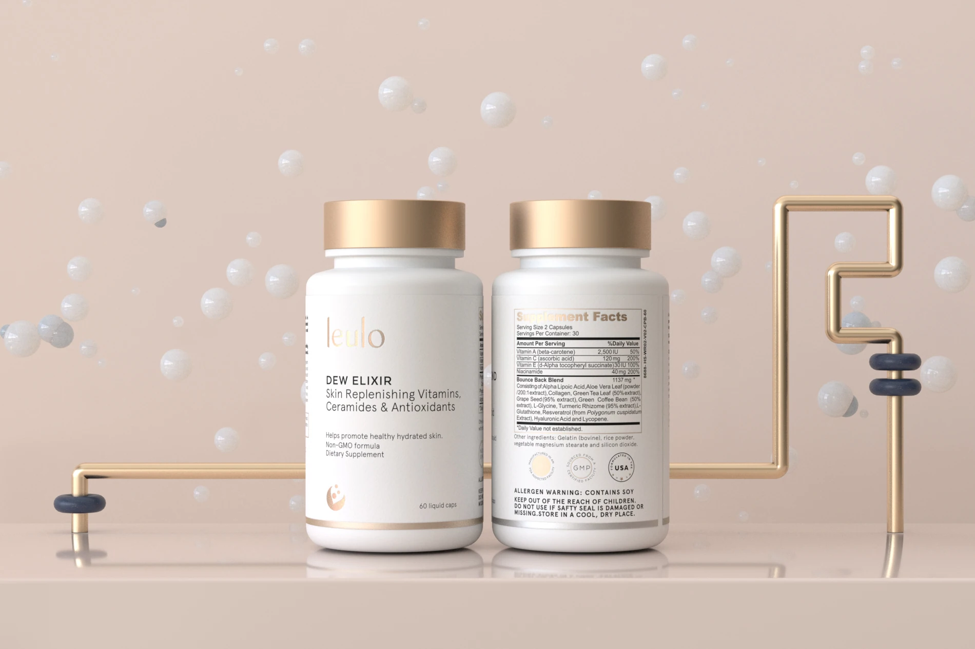 Two Leulo supplement bottles with gold piping in a pastel set
