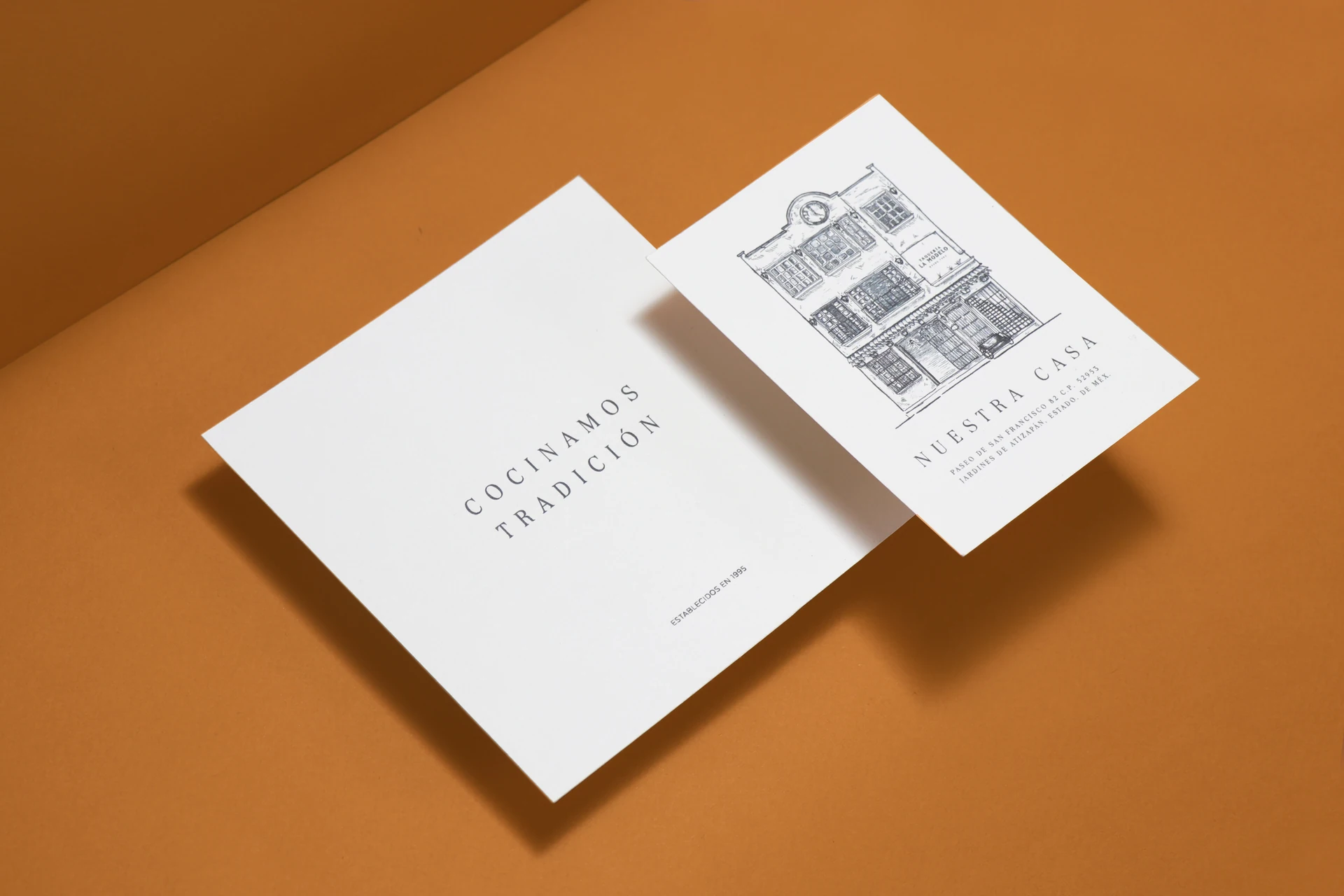 Taquería La Modelo “Cocinamos tradición” cards with building illustration