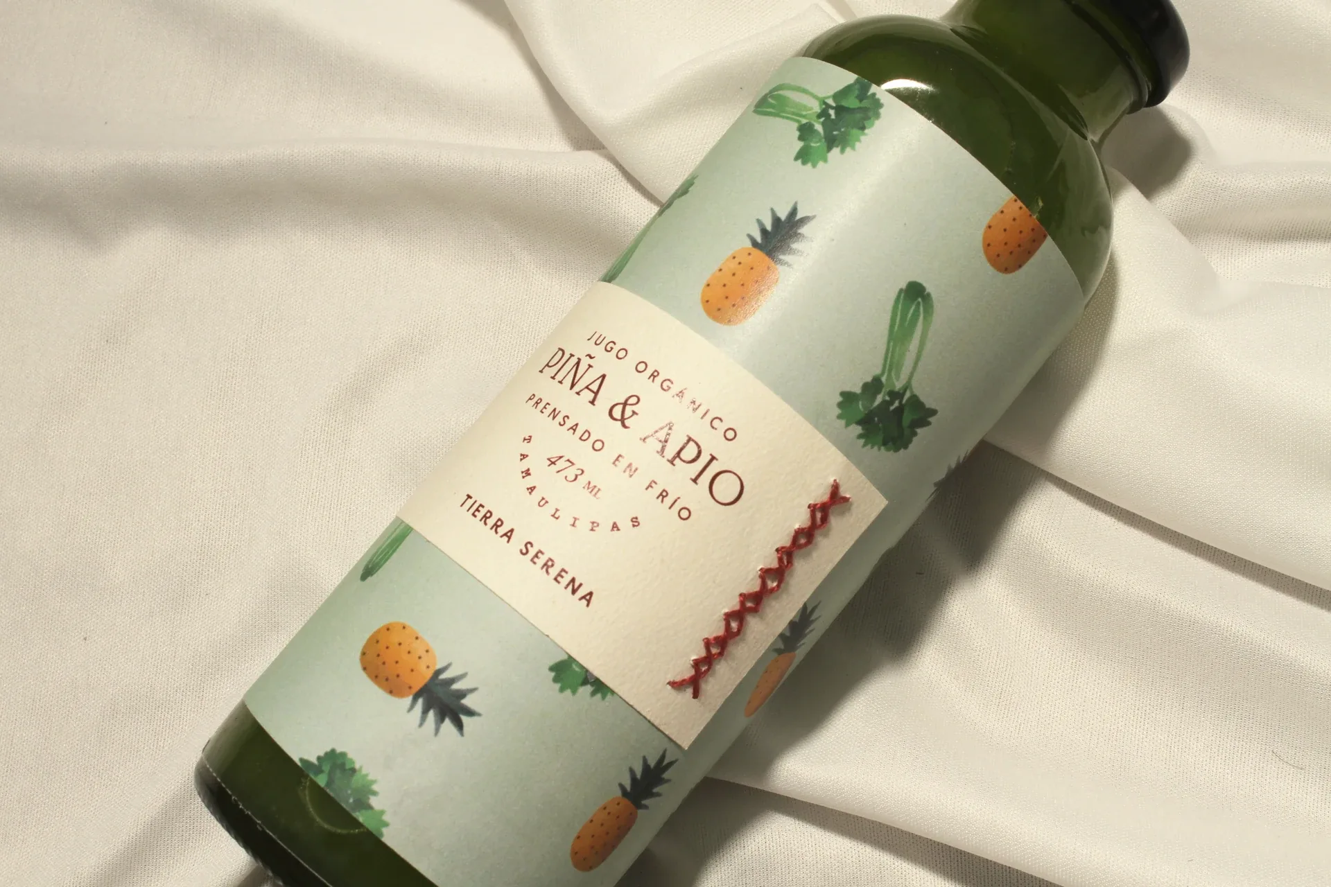 Tierra Serena pineapple-celery juice bottle label close-up